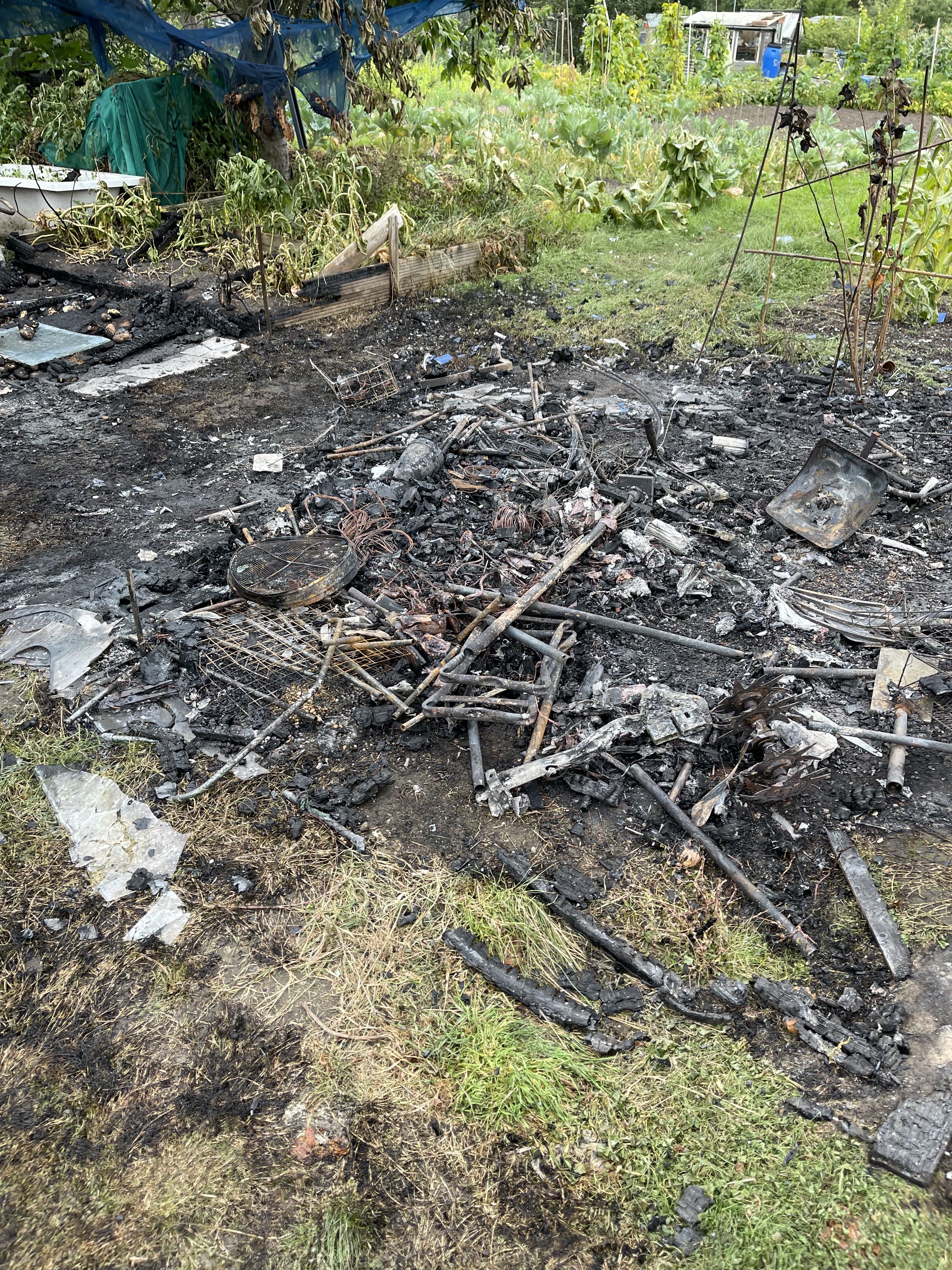 Two destroyed sheds